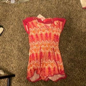 Pink romper comepletely new